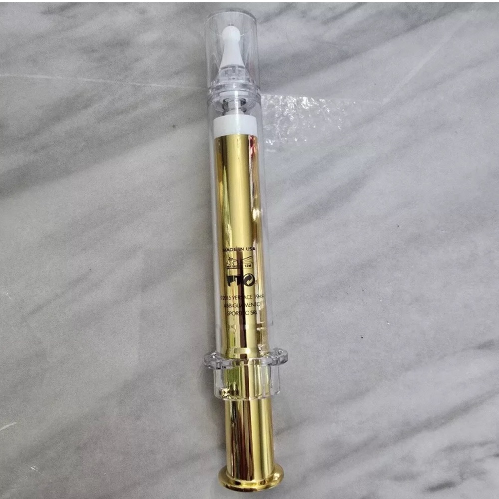 Luxury Gold Skincare Serum by Versace instant lift
